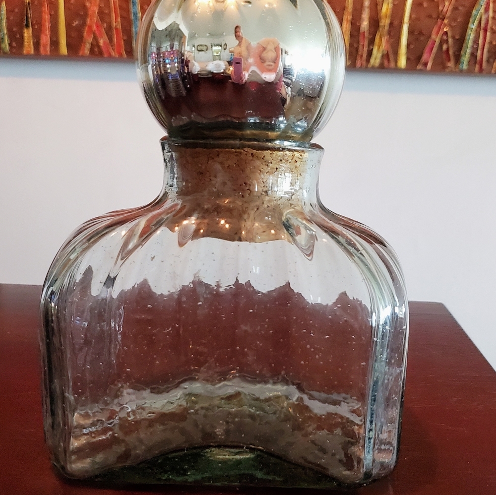 Vintage decanter w/mercury glass top